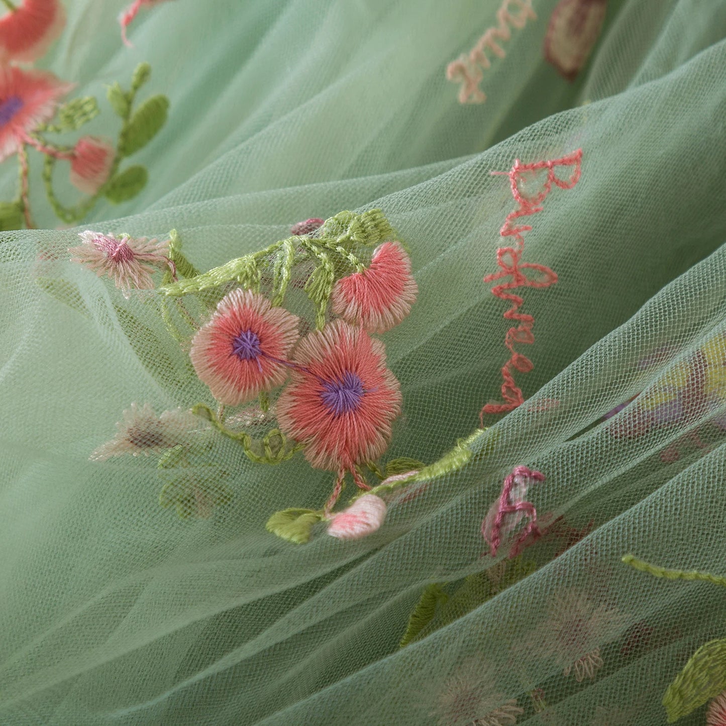 Close up of Flower embroidery dress green