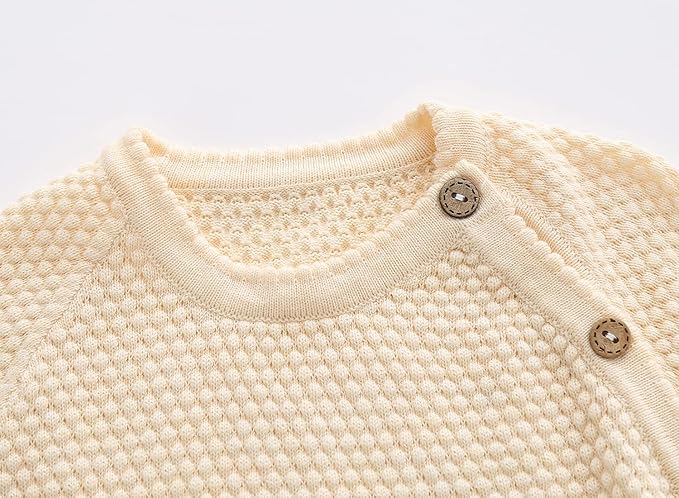 Close up of beige sweater top collar