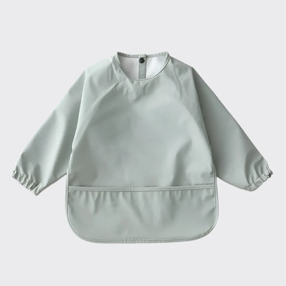 Green baby bib with bottom pocket