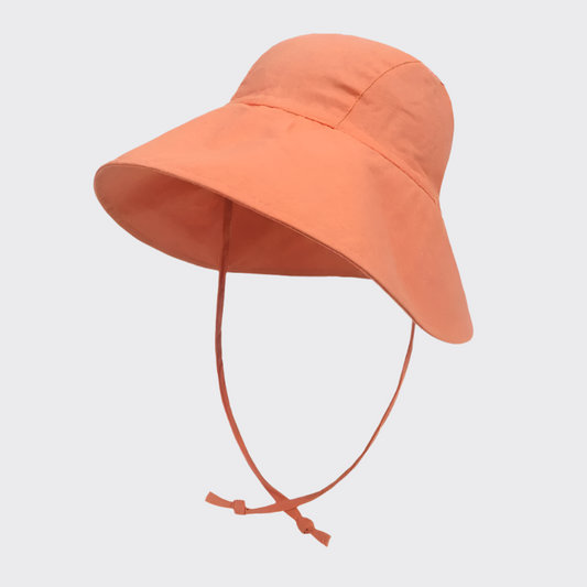 Pink colored linen sun hat front side profile