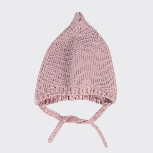 Pink knit hat with tie strings