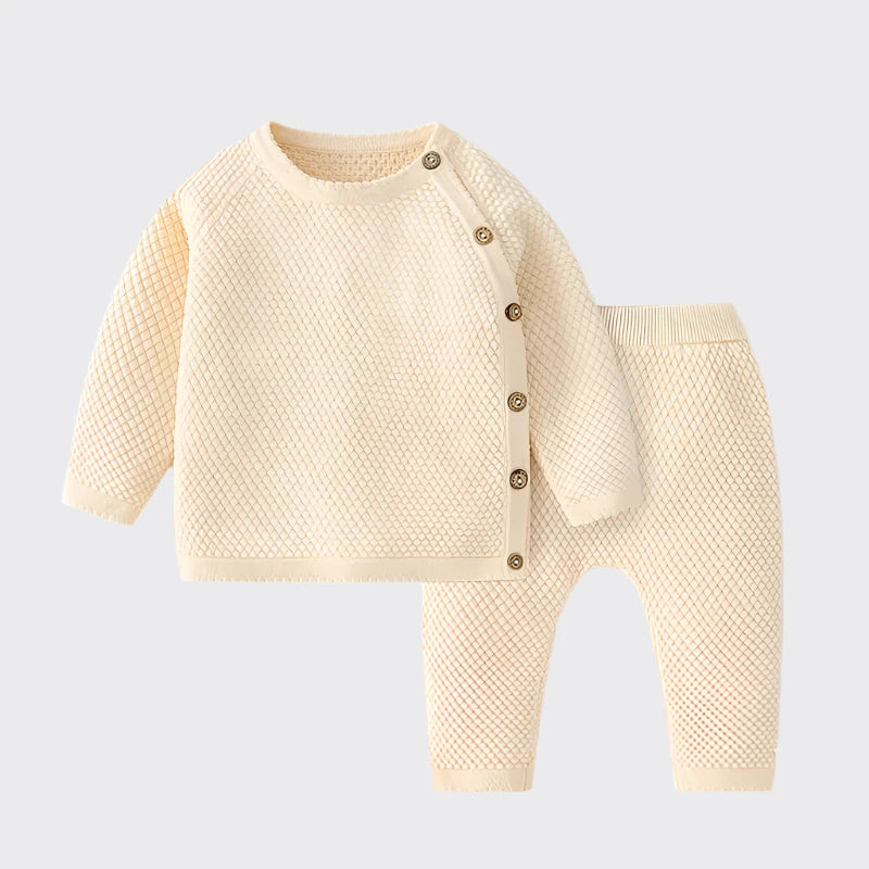 Sweater set in beige with brown buttons along side of sweater top